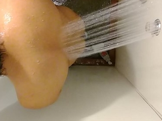Naked taking a shower
